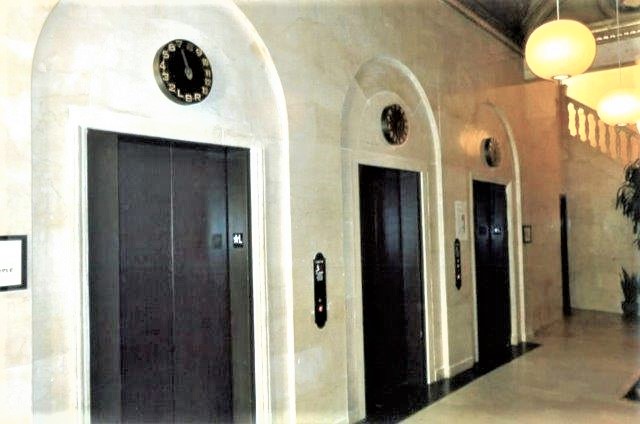 After: view of restored lobby elevators